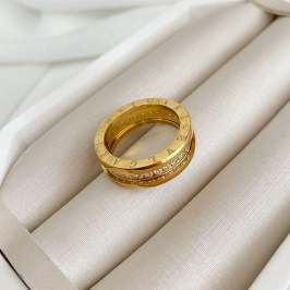 ALIANÇA AÇO BVLGARI MEIO EM PEDRAS