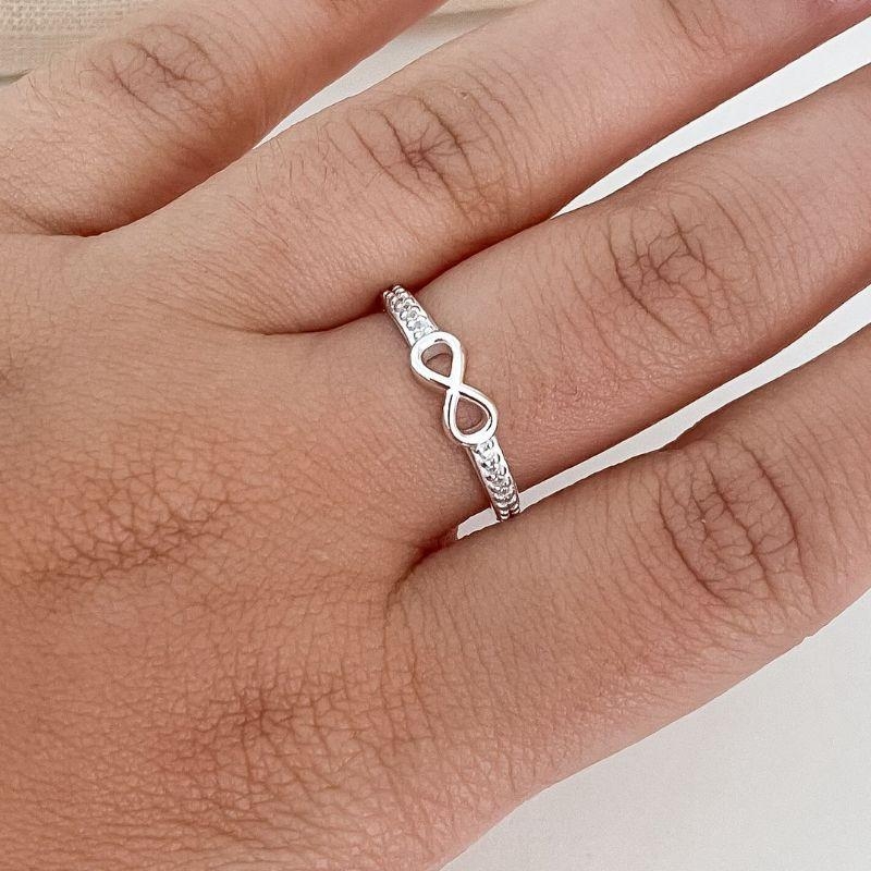 ANEL PT CRAVEJADO/INFINITO LISO