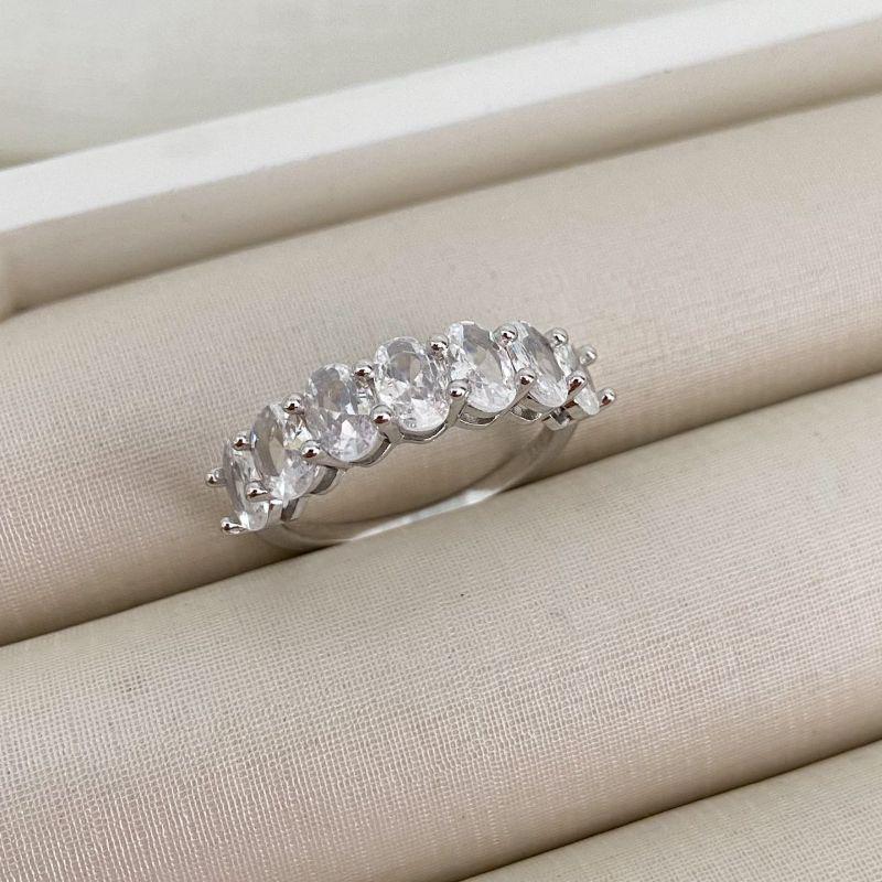 ANEL PT MEIA ALIANÇA PEDRAS OV CRISTAL