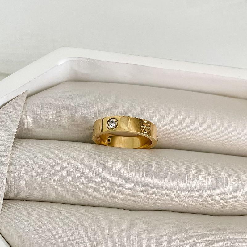 ALIANÇA CARTIER 3 PEDRAS