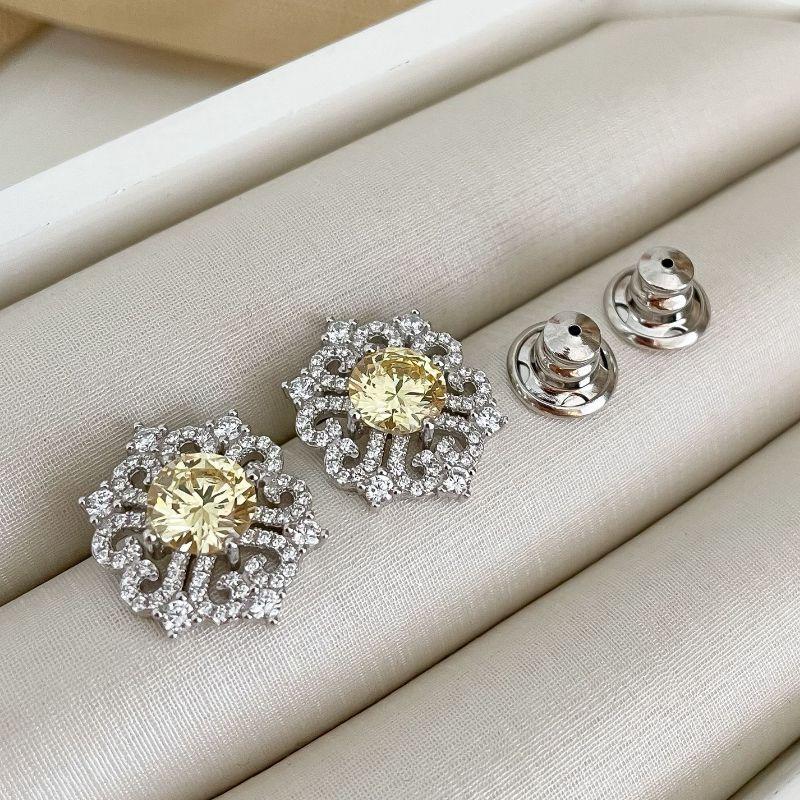 BR PT FLOR CRAVEJADA 1 PEDRA AMARELA