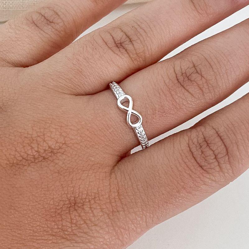 ANEL PT CRAVEJADO/INFINITO LISO