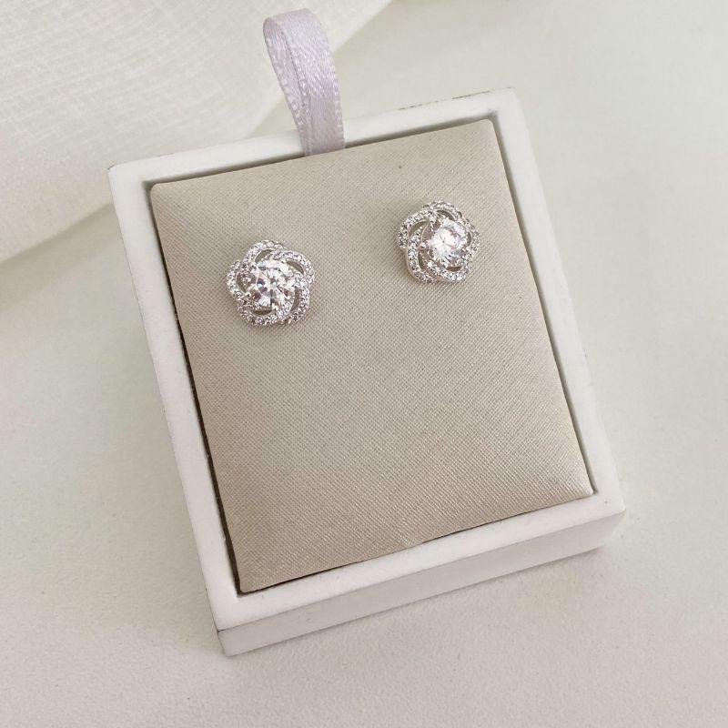 BR PT FLOR CRAVEJADA/ 1 PEDRA CRISTAL